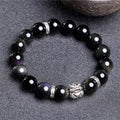 Obsidian bead bracelet with natural cloud patterns and a 999 silver clasp.