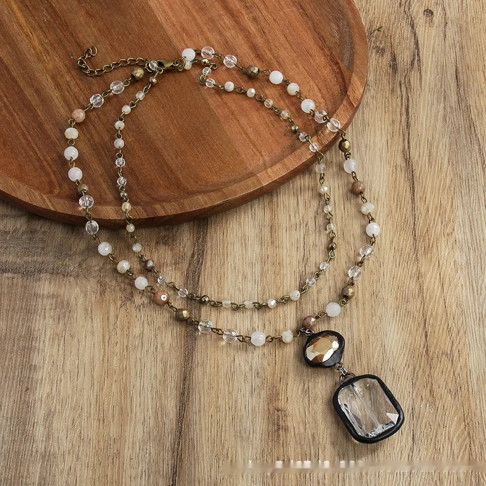 Tribal style two-layer necklace with natural stone and glass pendant on adjustable chain