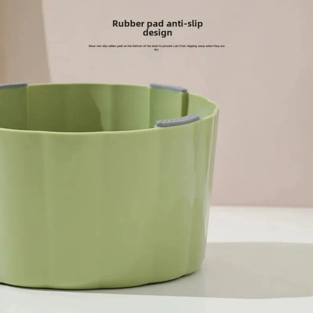 Solid colour raised cat bowl with cactus design, anti-slip base, and large mouth opening in dark green
