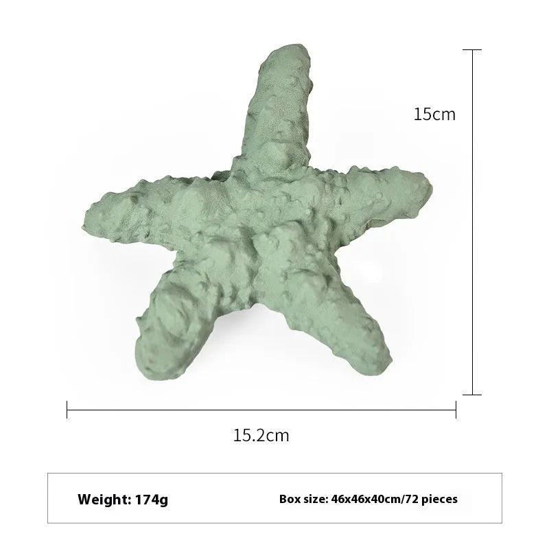 Shark-shaped rubber dog toy in marine colours including conch blue, conch green, starfish blue, and starfish green options