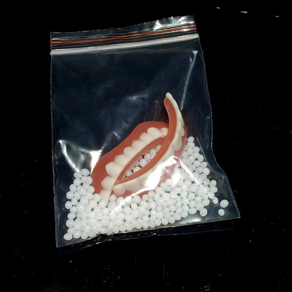 Silicone simulation dentures for dental training in colour-coded packaging