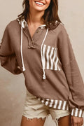 Straw yellow waffle texture hoodie with striped patchwork detail and button neck closure