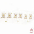 S925 sterling silver stud earrings with small petal crystal flowers in gold and platinum finishes.