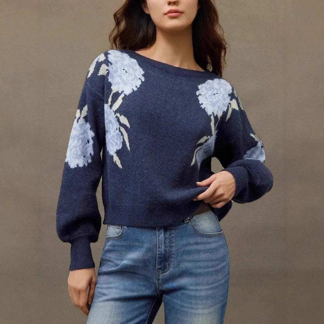 Sapphire blue women's loose pullover with woven floral jacquard pattern on chenille fabric.