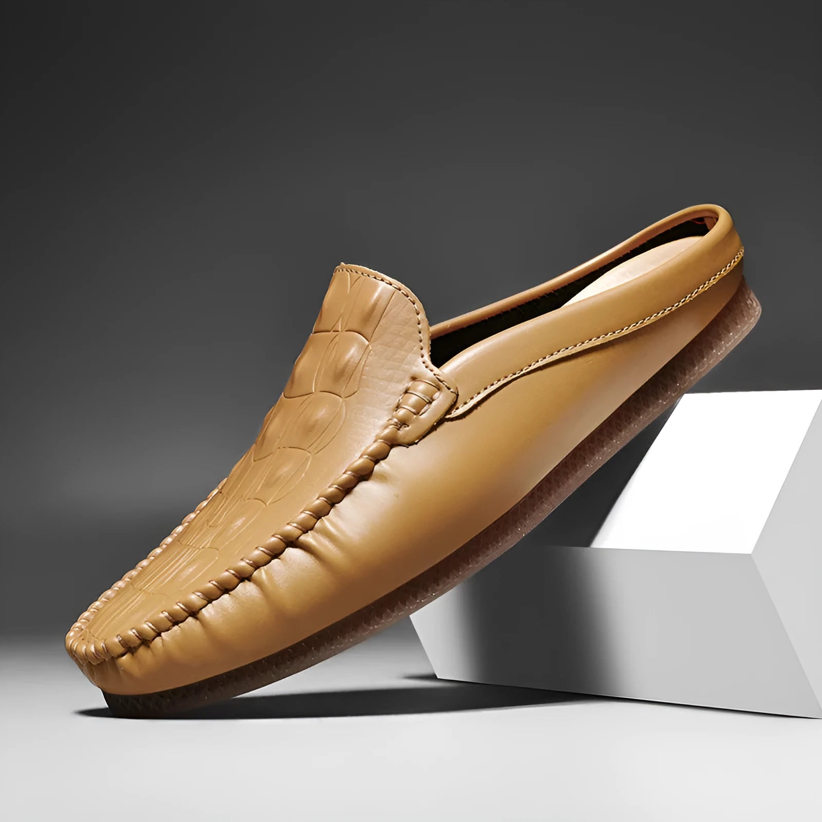 Men's black breathable semi-slippers with an artificial PU upper and rubber sole, shown from the side.