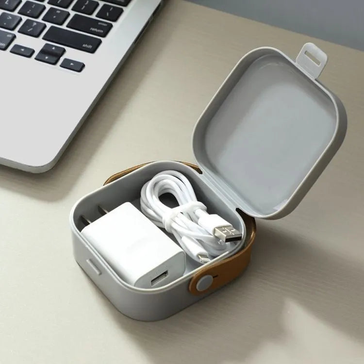 Medium solid colour polypropylene storage box for organising cables, shown in Nordic White.