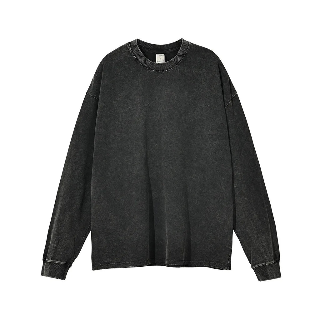 Man wearing a washed vintage style loose long sleeve cotton pullover shirt in a batik colour.