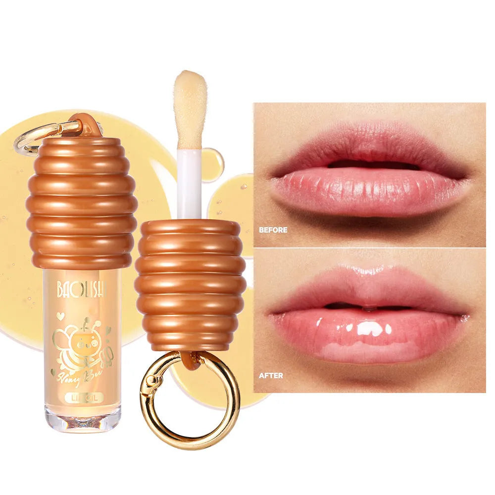 Portable honey lip gloss in keychain pannier bag with moisturising properties