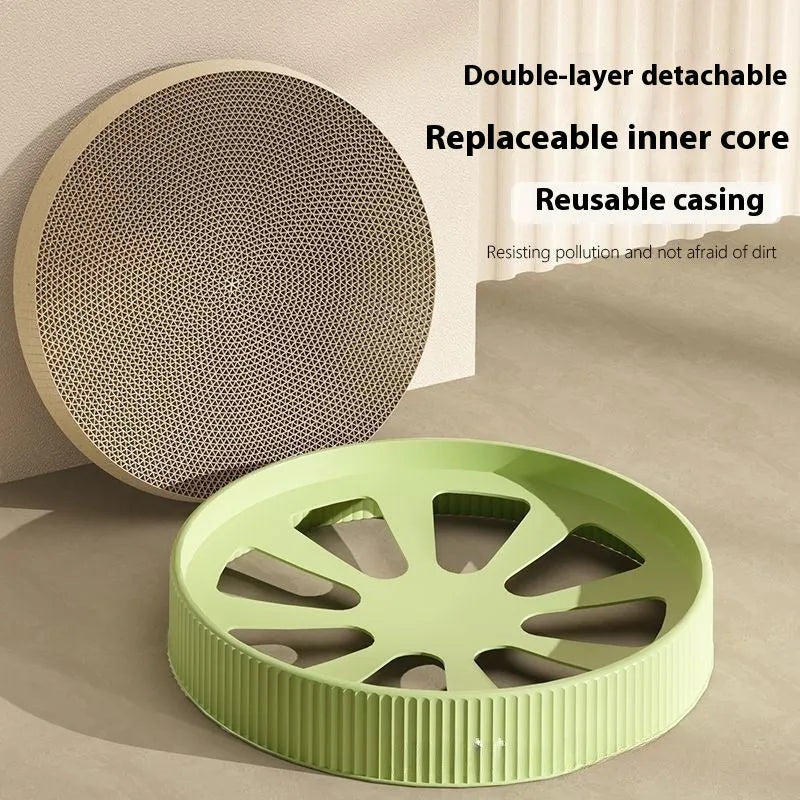 Green and white round cat scratching board with corrugated cardboard surface measuring 55cm across