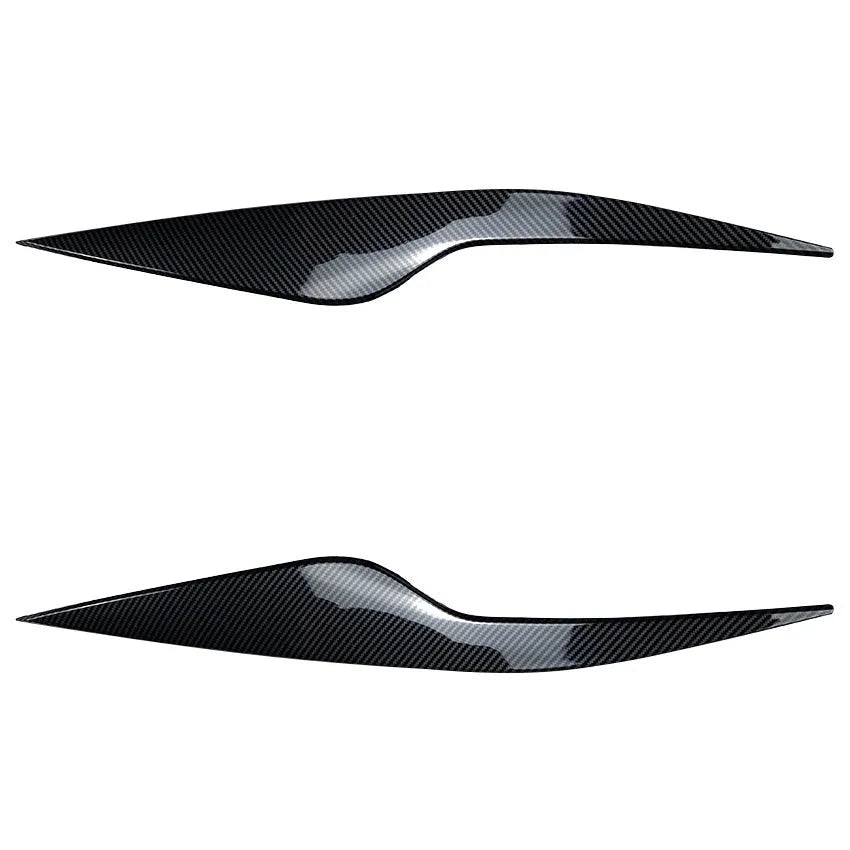 Ford Focus front headlight with carbon fiber pattern ABS eyebrow decal applied for external decorative modification