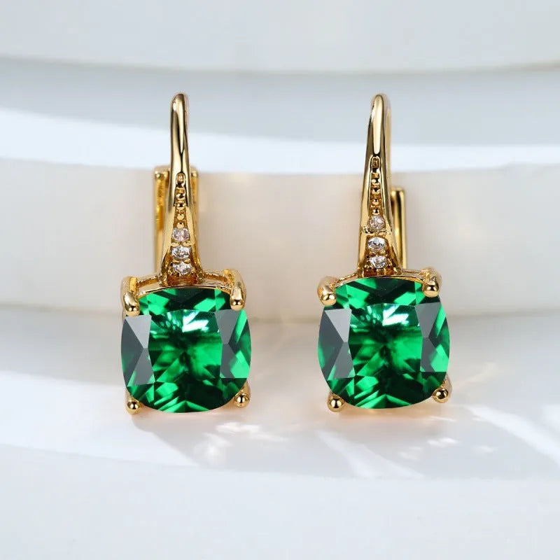 Square geometric ear clip with colourful moissanite inlay on an electroplated copper base.
