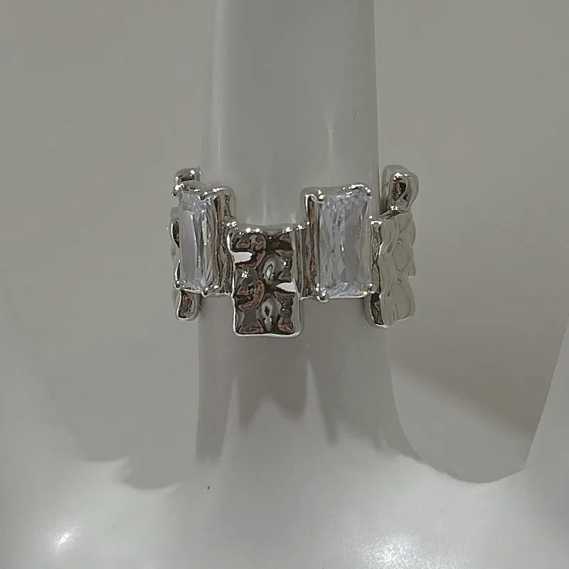 Geometric open gemstone ring in silver-plated metal with retro design