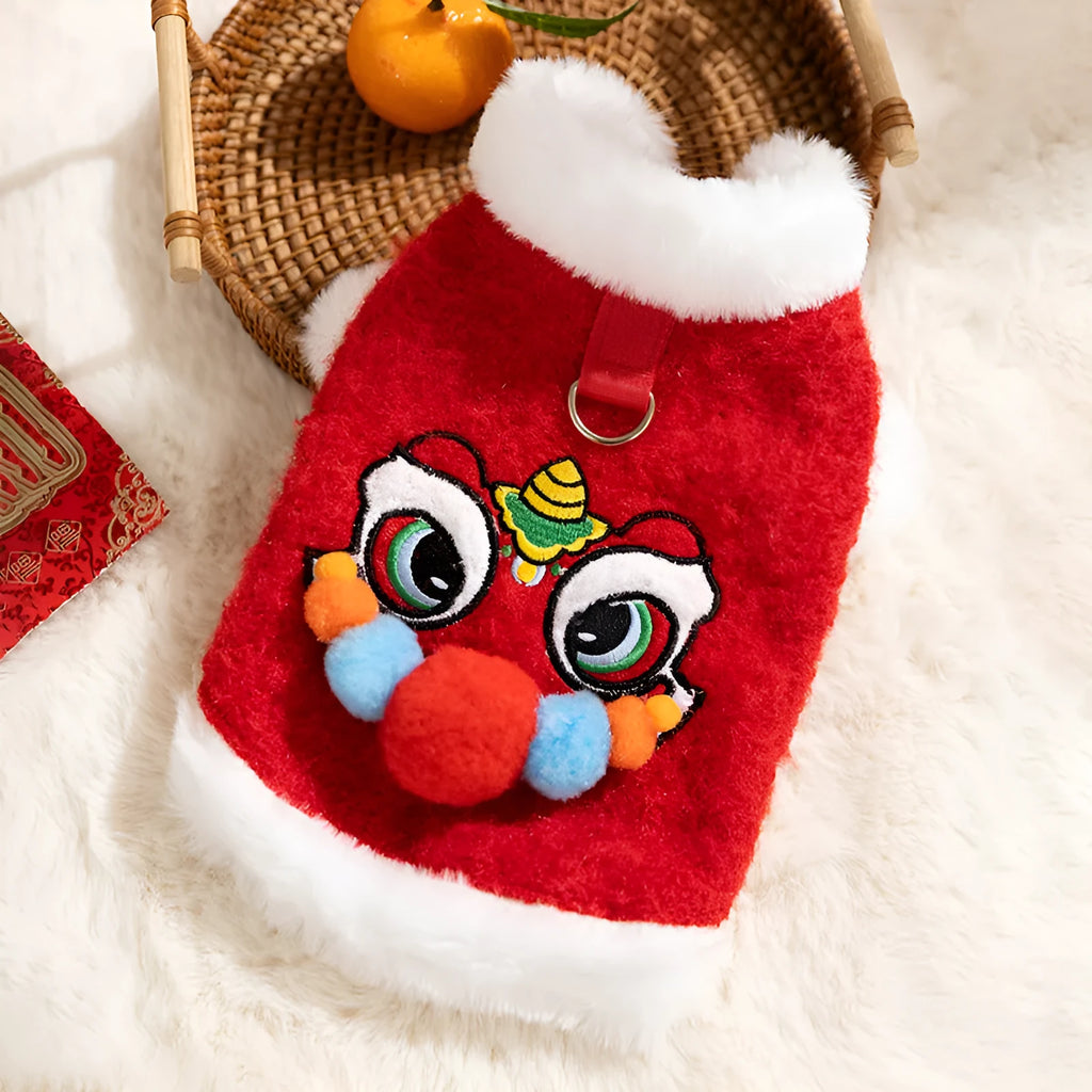 Red pet lion dance sweater with 3D face, colourful pom-poms, and leash ring on small dog