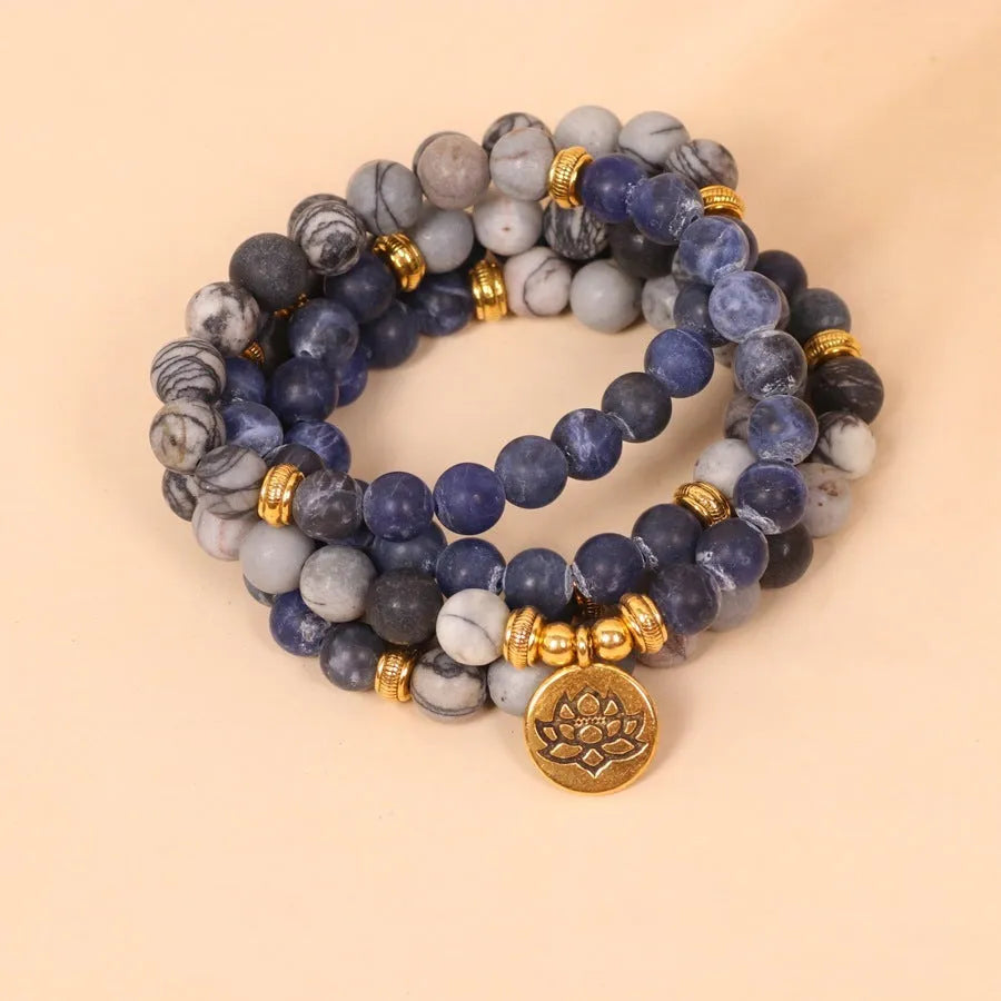 Blue multi layer alloy bracelet with patterned network stone beads