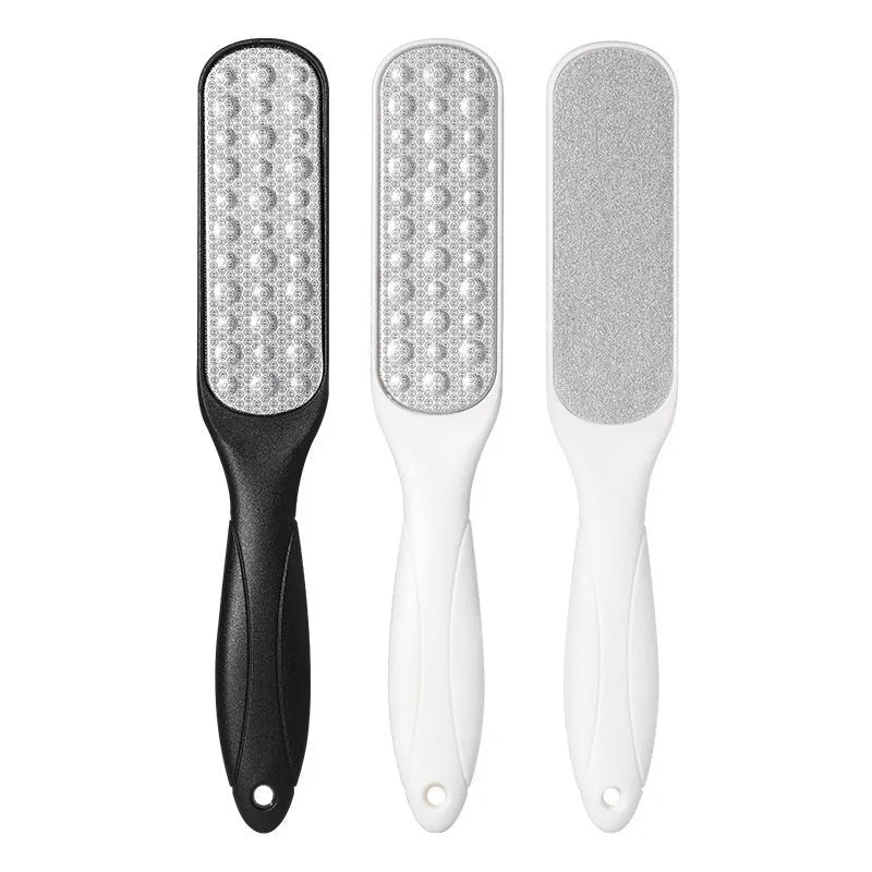 Stainless steel foot grinder with double-sided sandpaper file for pedicure and callus removal.