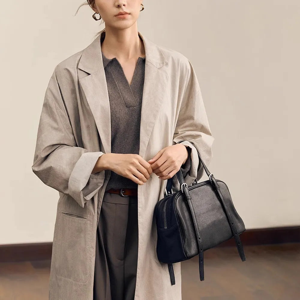 Women's genuine leather retro shoulder bag in horizontal square shape with double straps.