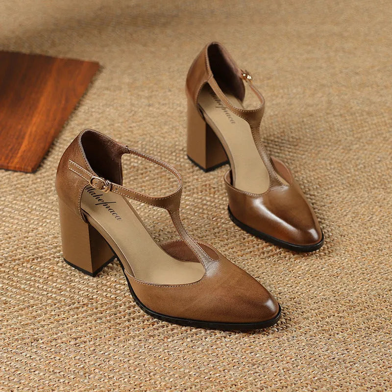 Baotou hollow women's retro pointed Mary Jane shoes in cowhide, showing buckle and hollow vamp design.
