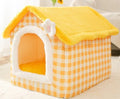 Foldable dog house pet cat bed in cave style with self-warming plush fur and non-slip bottom, available in multiple colours and sizes