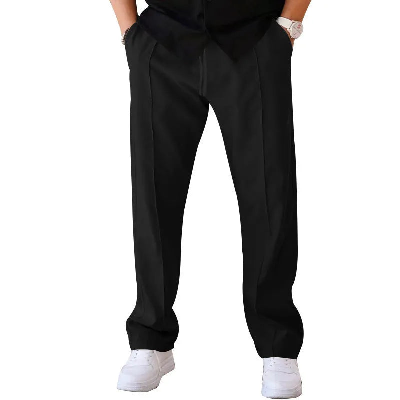 Men's loose straight drawstring trousers in waffle polyester fabric, shown in multiple colour options