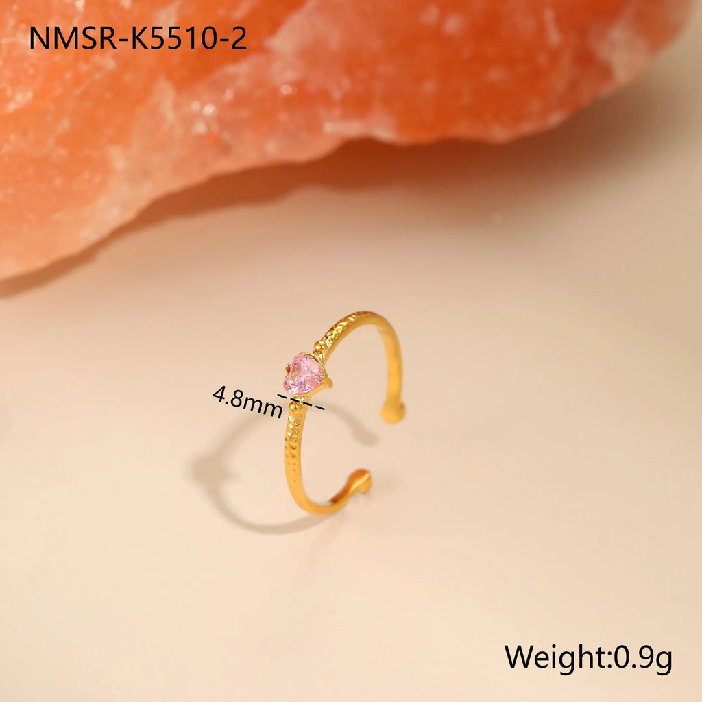 Open-ended stainless steel ring with heart-shaped zircon accents in adjustable free size design