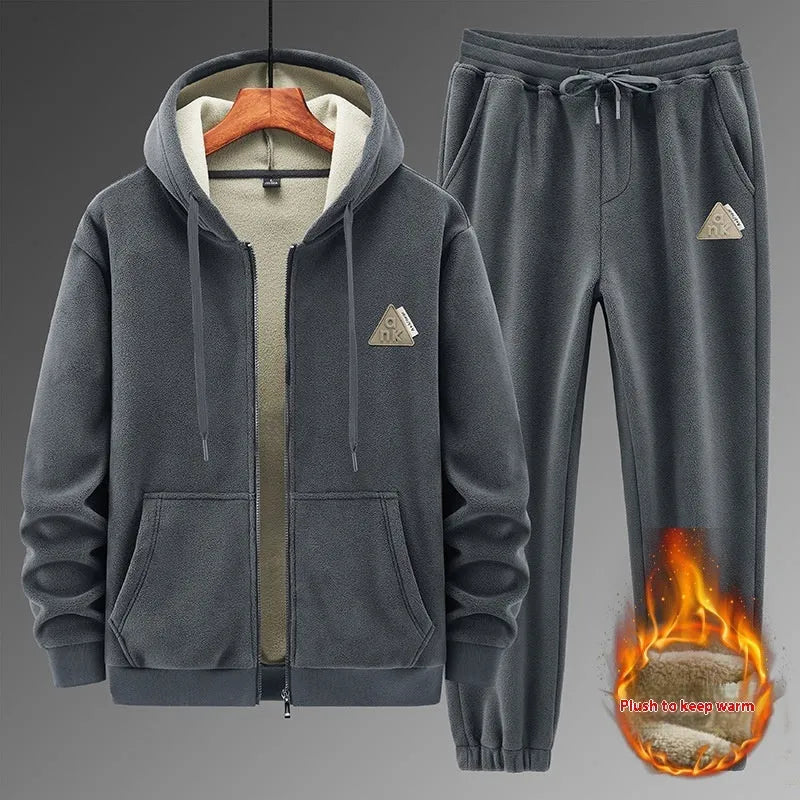 Men's grey cashmere-blend hooded sports sweater and matching trousers laid flat.