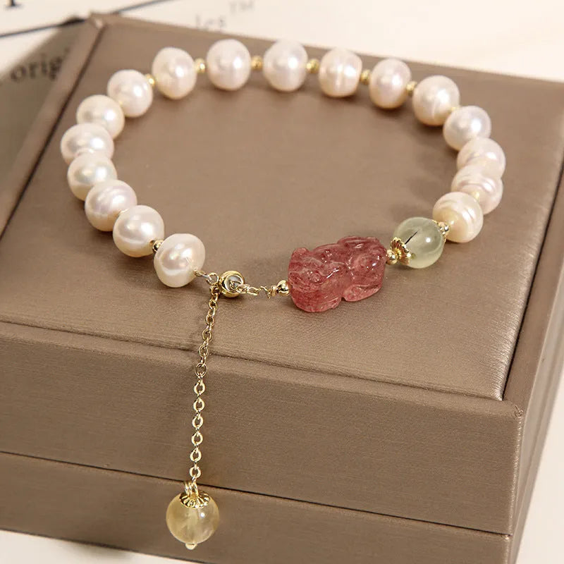 Natural garnet multi-layer crystal bracelet with strawberry quartz, moonstone, and pendant details in Korean light luxury style