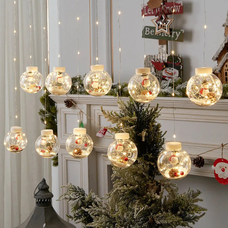 10-piece LED Christmas curtain light set with snowman, tree, and Santa ornaments for window decoration
