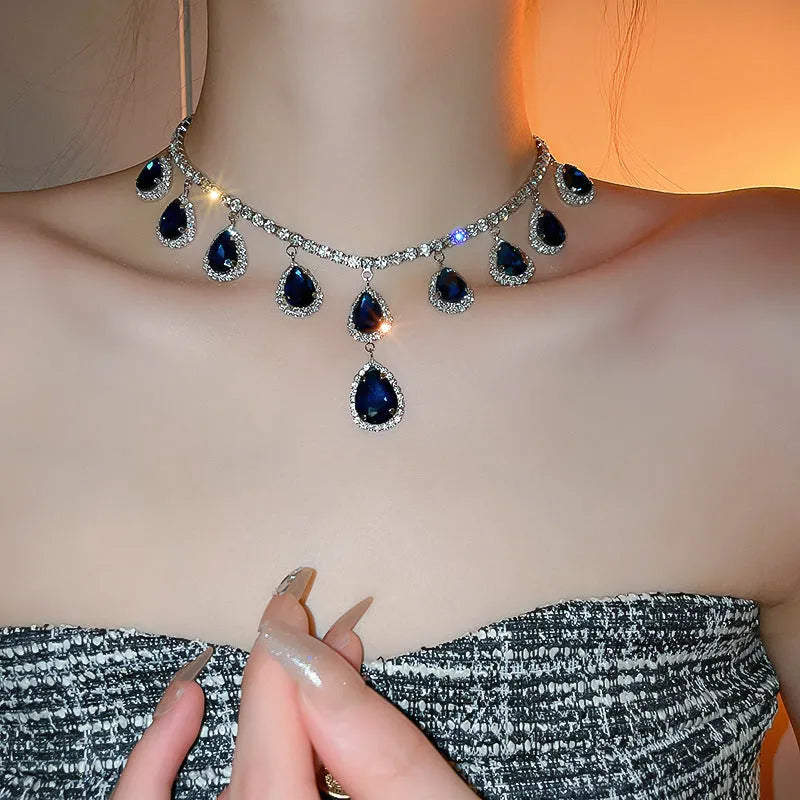 Silver needle water drop earrings and necklace set in blue and silver blue with alloy and zircon pendant