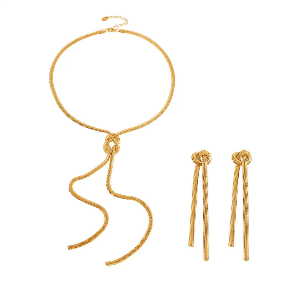 Gold knotted tassel necklace and matching earrings set on titanium steel snake chain