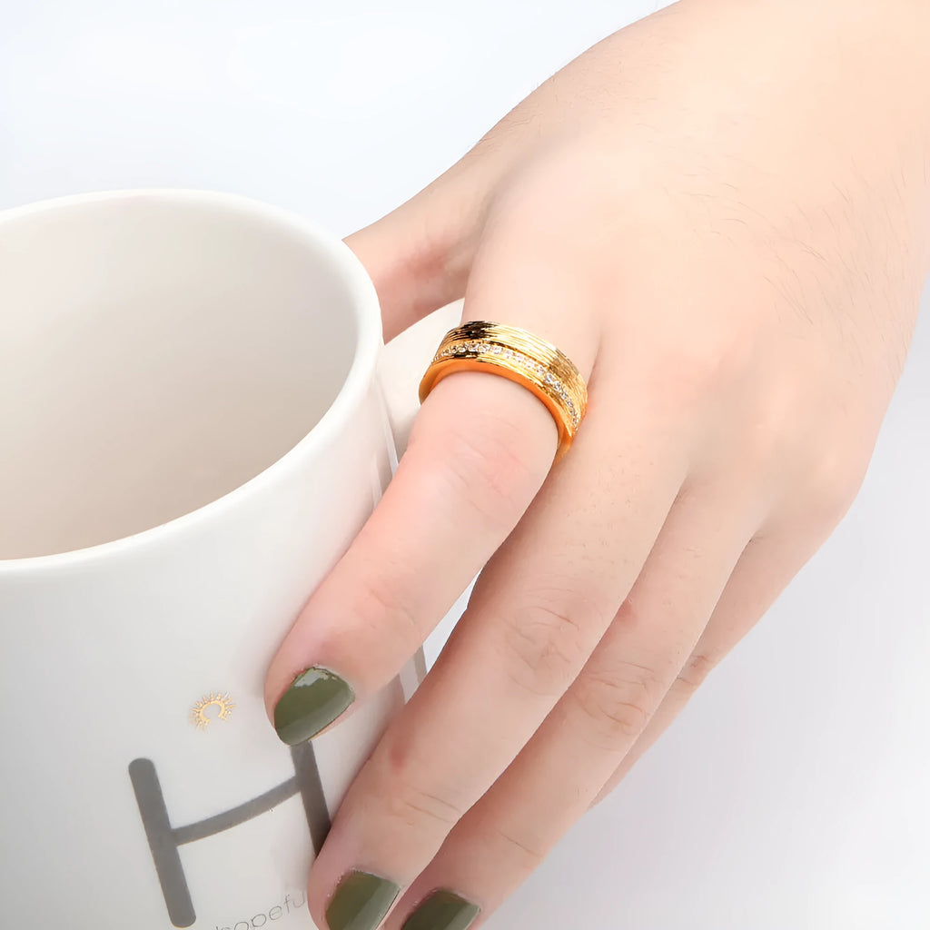 Gold geometric zircon ring for women, made from copper with electroplated finish.