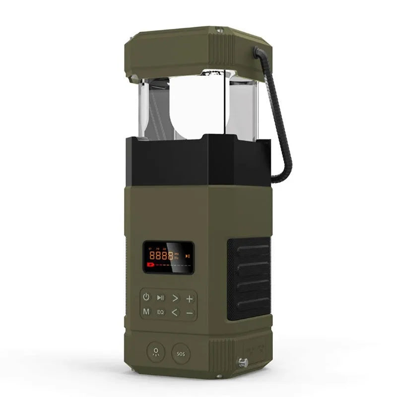 Solar radio Bluetooth speaker camping lantern with hand crank generator and power bank on outdoor background
