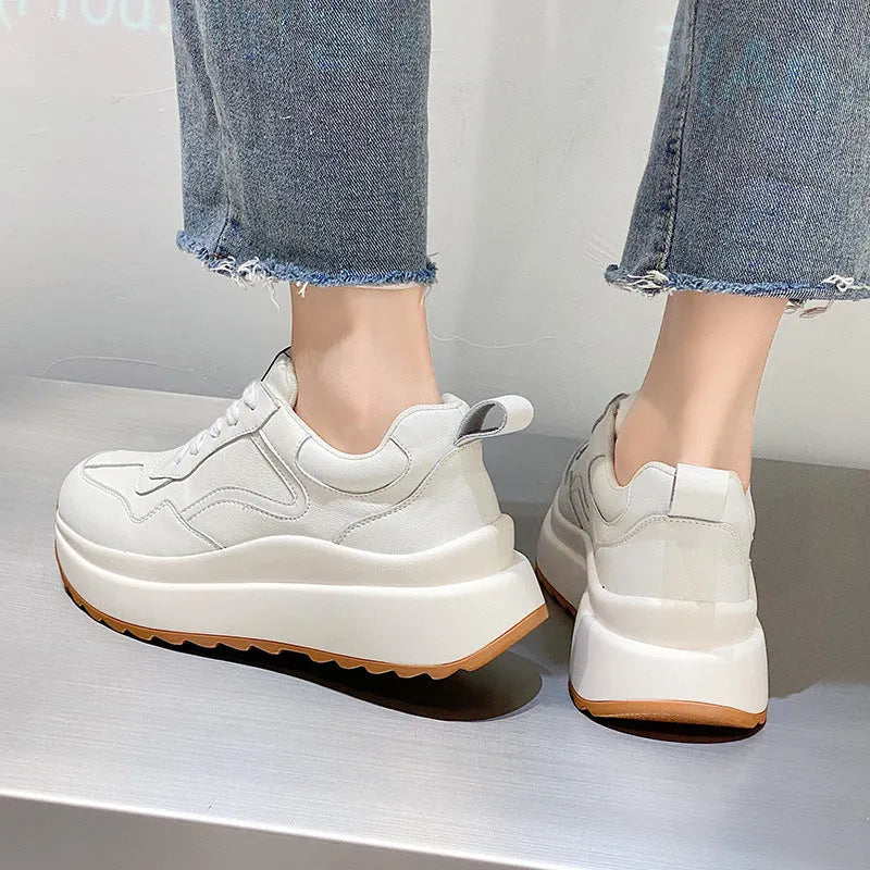 Beige women's low-top casual sports shoes made of cowhide leather with a cross-strap and English muffin heel.