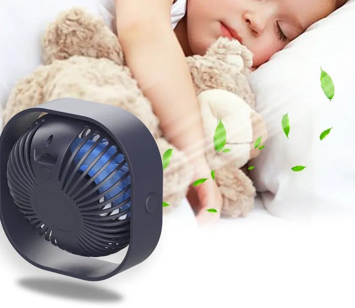 USB desk fan with alarm clock in blue, showing 360-degree rotating head and rotary switch.