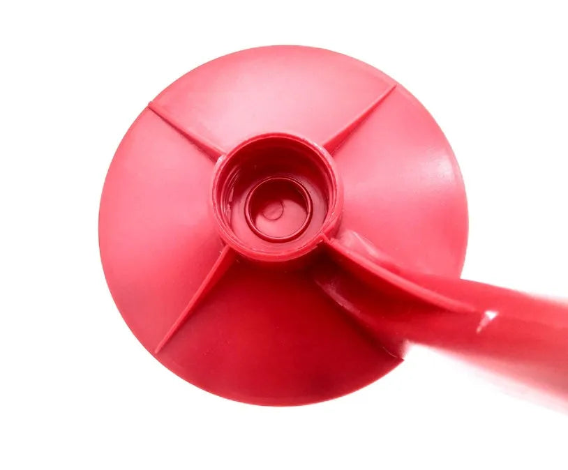 Red plastic Magic Tap soda dispenser attached to 2-litre bottle for push-button pouring