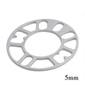 A single, circular metal automotive wheel hub spacer gasket for modifying wheel offset and brake clearance.