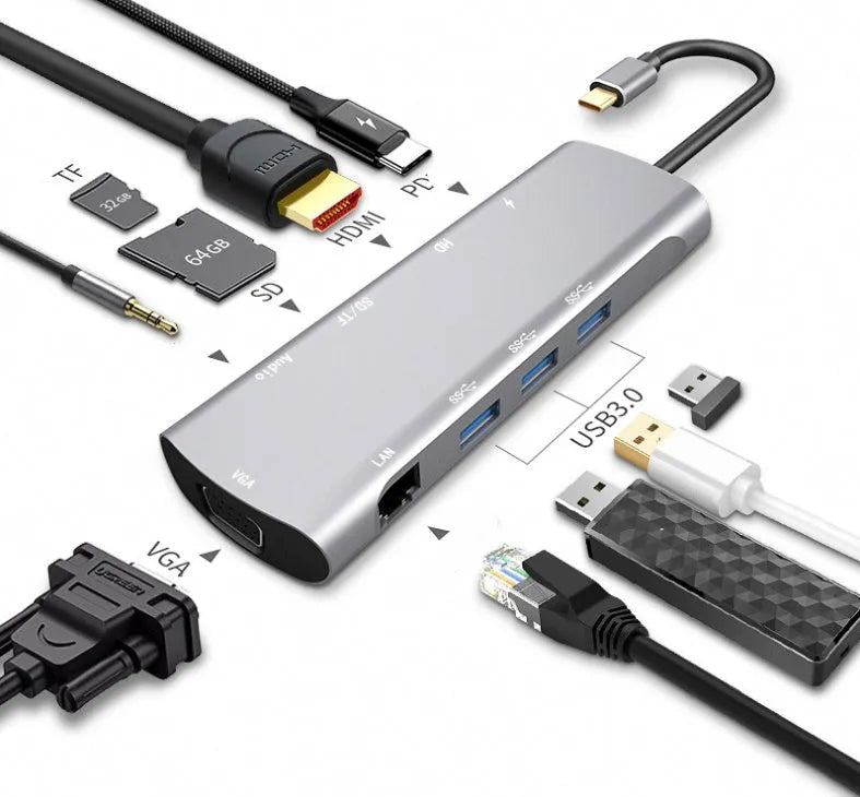 Grey aluminium USB-C docking station with HDMI, VGA, USB ports, and a short cable.