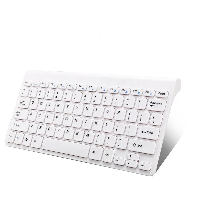 Black and white wireless keyboard and mouse set on wooden desk with 2.4GHz USB receiver