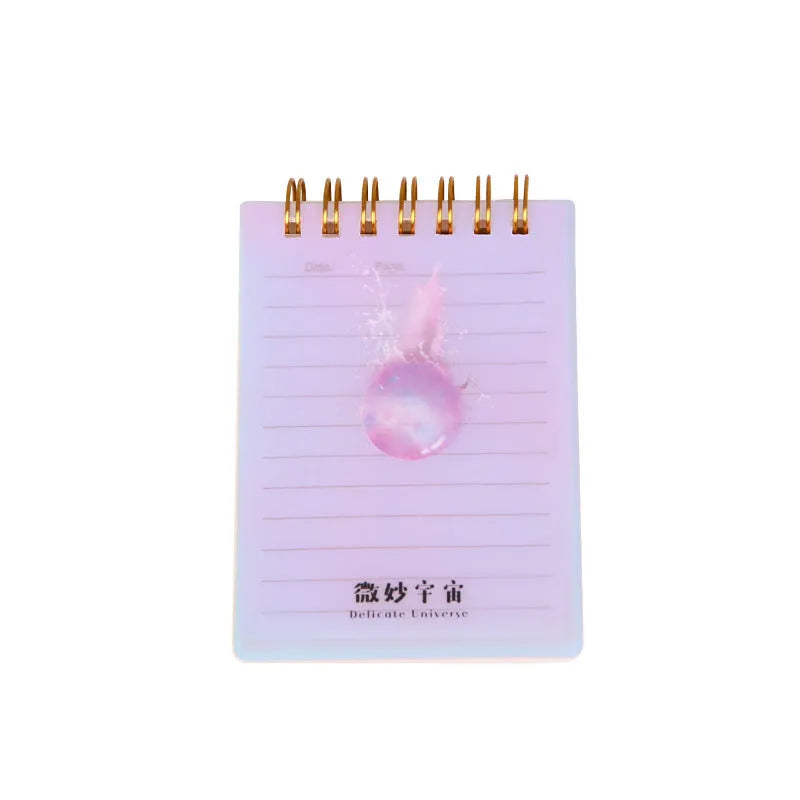 A7 spiral-bound notebook with a PP plastic cover in one of four colour options, showing the spiral binding and compact size.