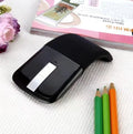 Black folding touch wireless mouse shown both folded and unfolded for portable use.