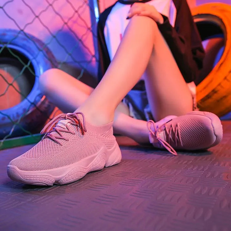 Women's white thick-soled casual trainers with woven upper and front strap design