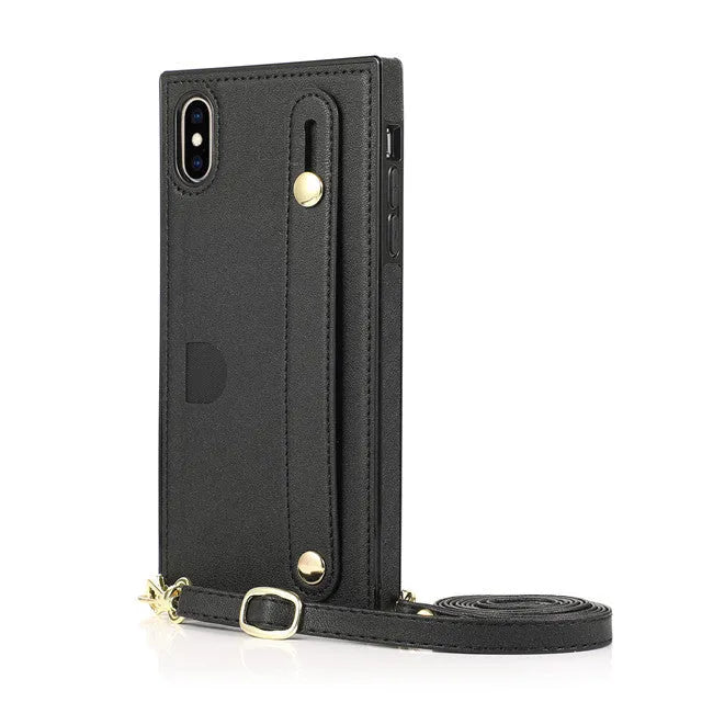 Black leather iPhone case with card holder slot and adjustable wristband holster attached.