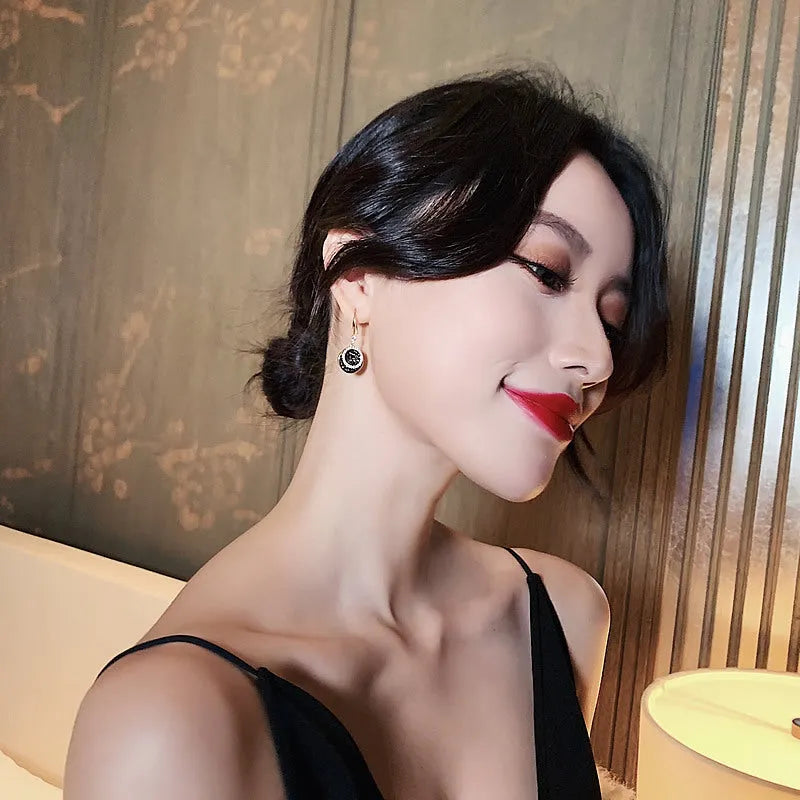 Black geometric retro Hong Kong style earrings with 3.6cm drop length and round alloy design