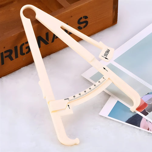 Clear acrylic body fat caliper with measurement scale showing 200mm range and 0.001mm accuracy.