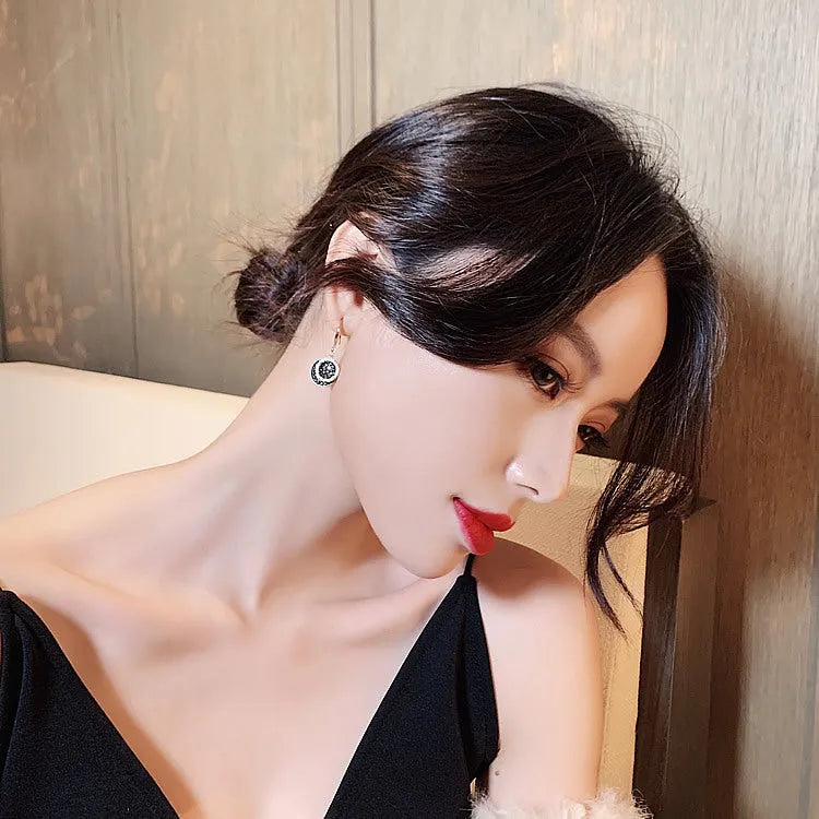 Black geometric retro Hong Kong style earrings with 3.6cm drop length and round alloy design