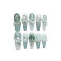 Green camouflage nail decals with bow and butterfly patterns and diamond camellia chains in four sizes