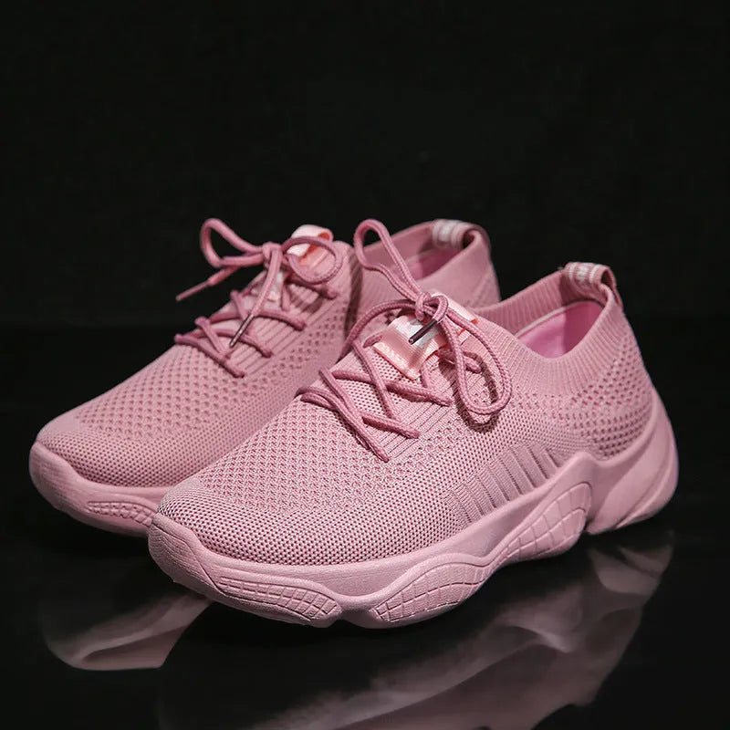 Women's white thick-soled casual trainers with woven upper and front strap design