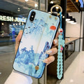 Rose flower patterned iPhone case with integrated wrist strap attachment for Apple smartphones