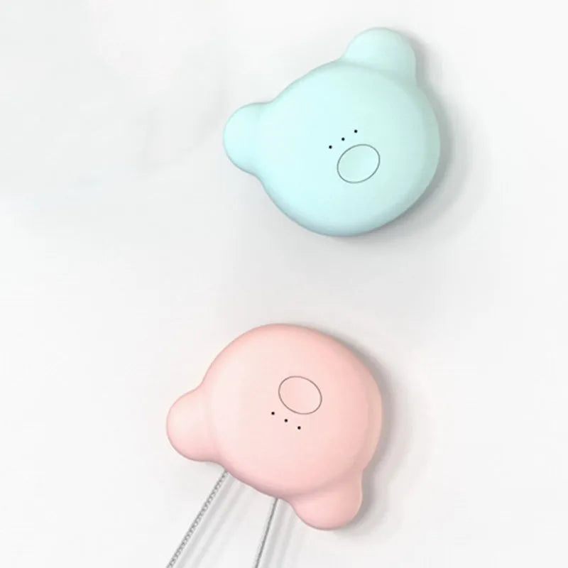 Mini USB portable air purifier necklace worn as a collar, showing pink and blue colour options.