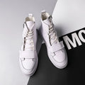 Black and white PU leather men's ankle boots with microfiber upper and high-top sneaker design for winter wear