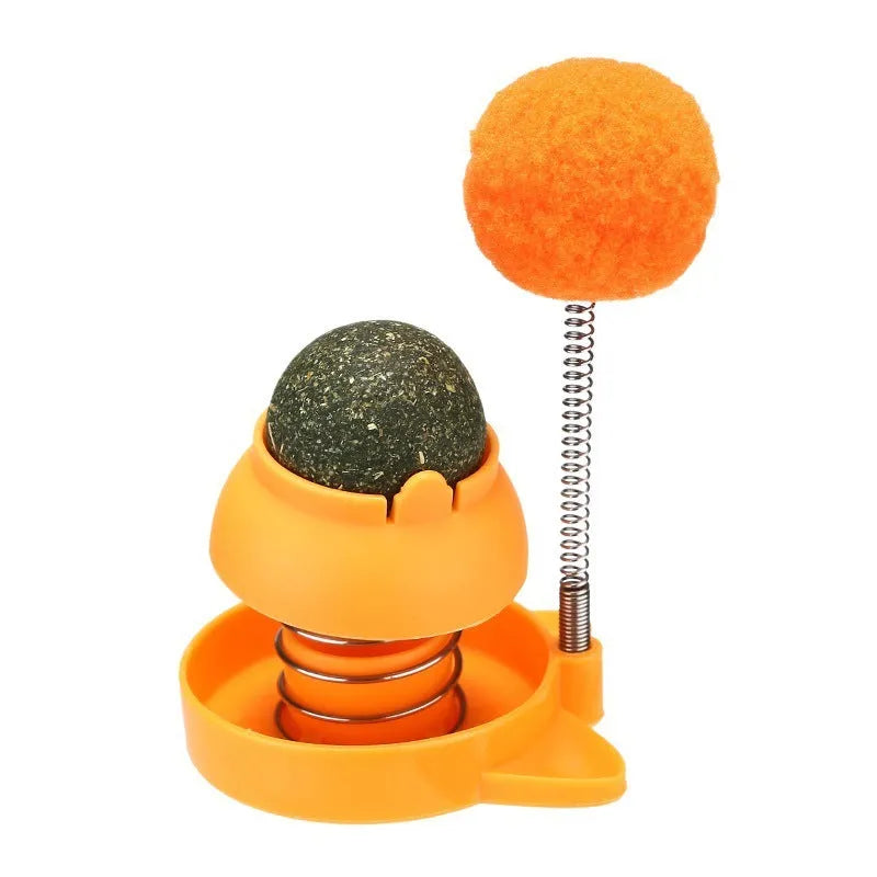 Blue, orange, and pink mint-flavoured cat toy ball with textured surface, 55mm in diameter.